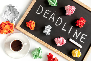 deadline concept on board at white background top view