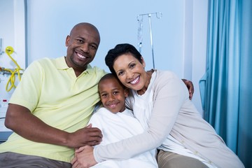 Portrait of smiling parents and patient