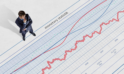 Pensive elegant businessman . Mixed media