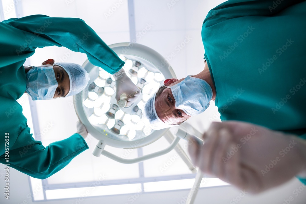 Poster surgeons operating in operation theater