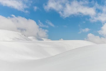 Fotobehang Snow hills against clear blue sky © NAVAPON