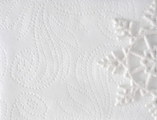 Christmas minimal elegant background. Snowflake on white paper texture