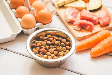 ingredients for pet food natural on wooden background