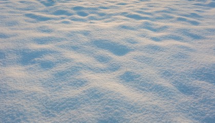 Close up of fresh snow lying on field