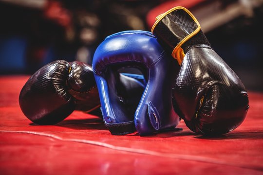 Boxing Headgear And Gloves In Boxing Ring