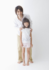 Father and daughter sitting close together