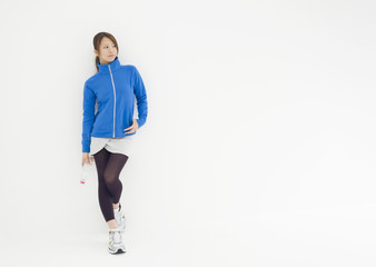 Young woman holding bottle of mineral water