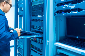 Man fix server network in data center room