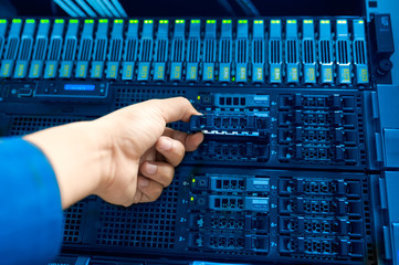 Man fix server network in data center room