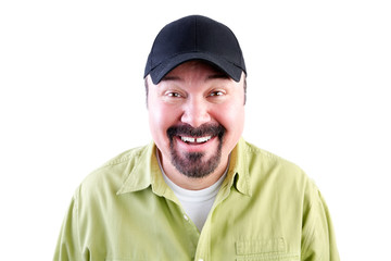 Portrait of grinning man in baseball cap