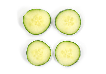 Four individual cucumber slices