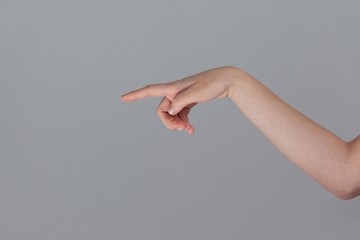 Hand of a woman pointing sideways