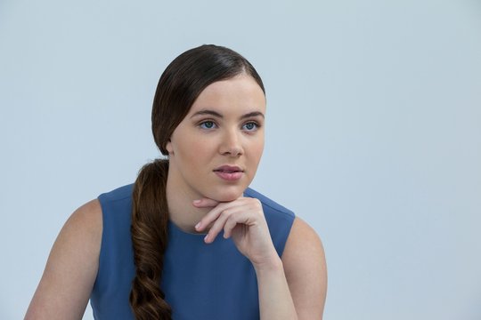 Thoughtful Woman With Hand On Chin