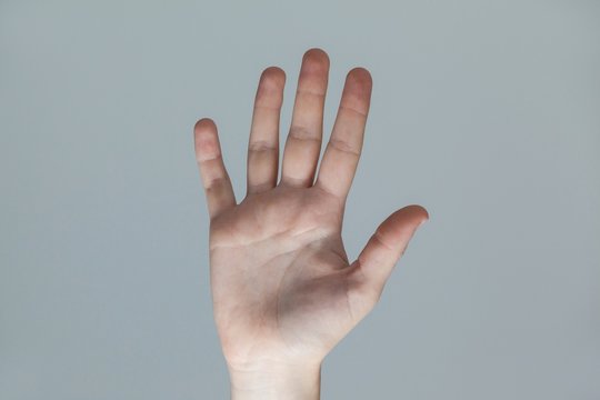 Hand of a woman touching an invisible screen