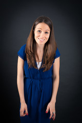 Obraz premium Beautiful woman doing different expressions in different sets of clothes: love