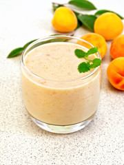 Milkshake apricot on granite table