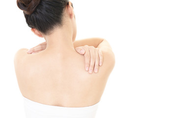 肩こりを訴える女性