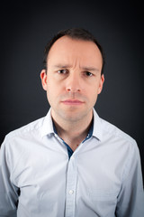 Handsome Man doing different expressions in different sets of clothes: angry