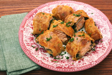 Salmon fillet and spinach with cheese baked in puff pastry