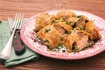 Salmon fillet and spinach with cheese baked in puff pastry