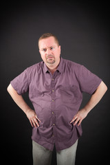 Handsome man doing different expressions in different sets of clothes: surprise