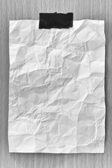 Note paper crumpled of empty and copy space on wooden background