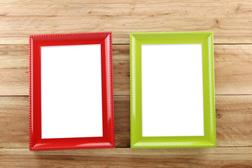  Vintage Photo frame on wooden background.