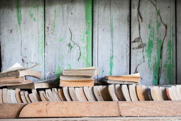 Book on wooden shelf