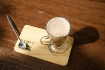 Cup of coffee on the table.