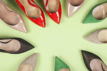 different shoes on light background. Copy space for text.