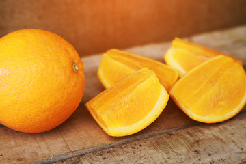 Fresh orange on wooden background for healthy. Organic or clean fruit from orchard in the market. Clean fruit and drink for healthy and diet. Low sugar fruit for diet and feeling fresh when drinking.