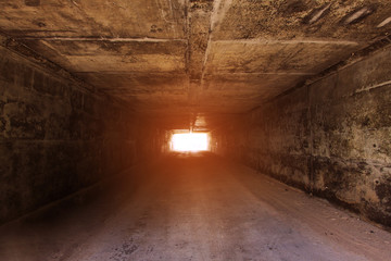 tunnel background and business concept. tunnel with old brick. the end of tunnel and concept business successfully. mystery tunnel or mystery way. tunnel damaged and waited for repair.