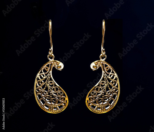 &quot;beautiful gold ornaments on a dark background. jewelry for women