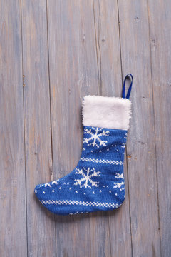 Christmas sock with on wooden background