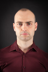 Obraz premium Handsome Man doing different expressions in different sets of clothes: thinking