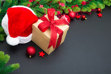 Christmas gift box. Christmas presents in red boxes at black woo