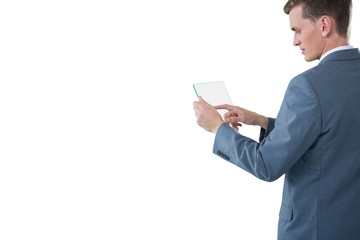 Businessman touching an glass sheet