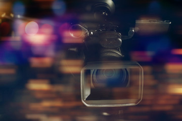 professional video camcorder in studio with blurred background - obrazy, fototapety, plakaty