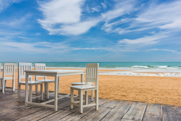 Fototapeta na wymiar wood floor and seaside table with beach and sea background