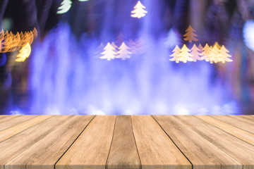 Empty wooden table space platform and blurred Bokeh Christmas Happy New Year and Valentine's Day. background for product display montage
