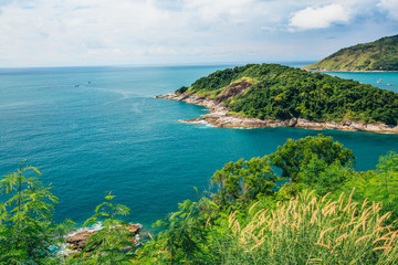 Fototapeta na wymiar Phromthep Cape, Beautiful Andaman sea view in Phuket island, Thailand. Blue sky and turquoise colour sea,Island in Thailand