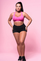 Obraz premium Pleasant beautiful plump woman posing on pink background