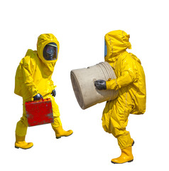 Fototapeta premium Isolated man in yellow protective hazmat suit 