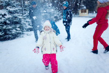 Active leisure with children in winter on cold days.