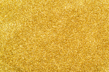 Gold glitter background sparkling sequin. Festive texture for your design