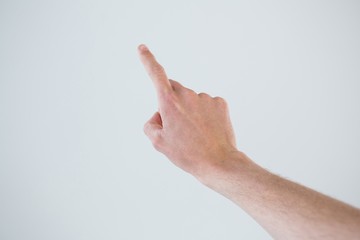 Hand of a man pointing upwards