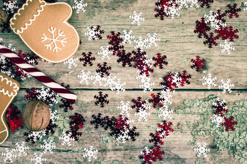 Winter composition with lollipop, gingerbread cookies and pine c