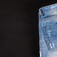 jeans lying on a dark