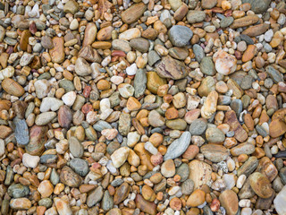 Rock on the sand at beach texture for background