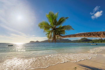 Beach at sunset time on Mahe island in Seychelles